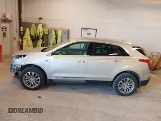 2017 Cadillac XT5 Luxury AWD z VIN 1GYKNDRS1HZ160606, wystawiony jako IAAI lot #41990425 z przebiegiem 130 822 mil mil oraz . Historia ofert i sprzedaży dostępna na DreamBid. Obrazek 14.
