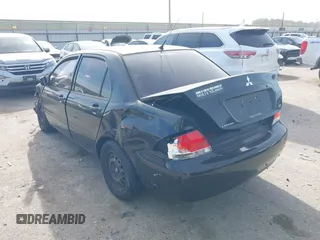 2006 Mitsubishi Lancer ES with VIN JA3AJ26EX6U059654, listed as a IAAI auction lot 41817577 with 180,177 mi miles. Bid and sale history available at carsss.com. Image 3.