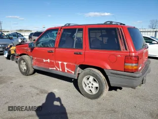 1994 Jeep Grand Cherokee Laredo with VIN 1J4GZ58S8RC254097, listed as a Copart auction lot 47379645 with 240,739 mi miles and Salvage Title. Bid and sale history available at carsss.com. Image 2.