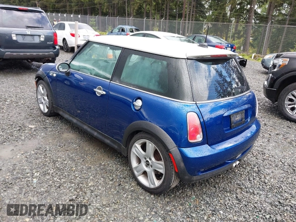 2003 MINI Hardtop S z VIN WMWRE33433TD60388, wystawiony jako IAAI lot #42313209 z przebiegiem 125 869 mil mil oraz . Historia ofert i sprzedaży dostępna na DreamBid. Obrazek 3.