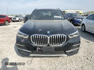 2023 BMW X5 xDrive45e z VIN 5UXTA6C03P9P26996, wystawiony jako Copart lot #53747565 z przebiegiem 52 599 mil mil oraz Szkoda całkowita • Salvage title. Historia ofert i sprzedaży dostępna na DreamBid. Obrazek 5.