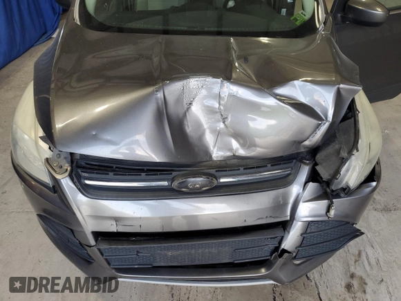 2013 Ford Escape SE with VIN 1FMCU0GX7DUC84970, listed as a Copart auction lot 59611935 with 138,605 mi miles and Salvage title. Bid and sale history available at DreamBid. Image 12.