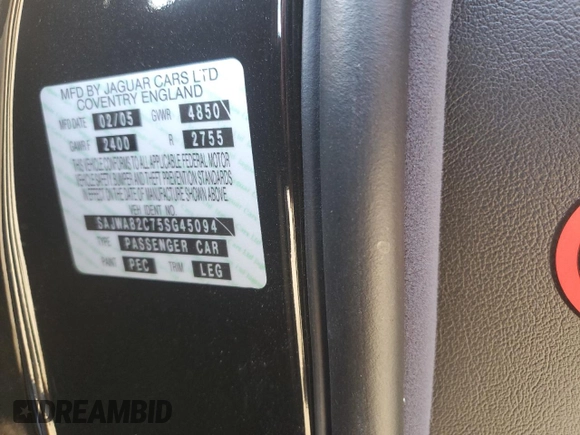 2005 Jaguar XJ Vanden Plas z VIN SAJWA82C75SG45094, wystawiony jako Copart lot #83891564 z przebiegiem 57 467 mil mil oraz Szkoda całkowita • Salvage title. Historia ofert i sprzedaży dostępna na DreamBid. Obrazek 13.