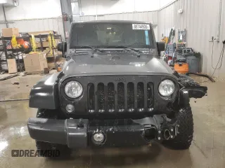 2017 Jeep Wrangler Willys Wheeler with VIN 1C4AJWAG9HL696710, listed as a Copart auction lot 88744905 with 66,800 mi miles and Salvage Title. Bid and sale history available at DreamBid. Image 5.
