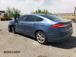 2018 Ford Fusion SE z VIN 3FA6P0LU1JR232876, wystawiony jako Copart lot #52911185 z przebiegiem 116 889 mil mil oraz Nie do naprawy • Non repairable. Historia ofert i sprzedaży dostępna na DreamBid. Obrazek 2.