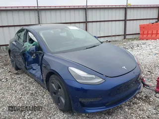 2022 Tesla Model 3 Long Range z VIN 5YJ3E1EB6NF250866, wystawiony jako IAAI lot #42059963 z przebiegiem 20 004 mil mil oraz . Historia ofert i sprzedaży dostępna na DreamBid. Obrazek 1.