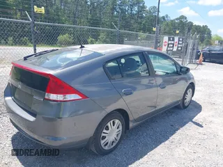 2010 Honda Insight LX with VIN JHMZE2H56AS002473, listed as a IAAI auction lot 41983606 with Not Provided miles and . Bid and sale history available at DreamBid. Image 4.