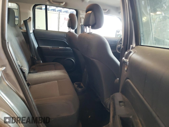 2013 Jeep Patriot Sport with VIN 1C4NJRBB8DD243057, listed as a Copart auction lot 49720475 with 119,758 mi miles and Salvage Title. Bid and sale history available at DreamBid. Image 11.