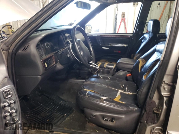1997 Jeep Grand Cherokee Laredo with VIN 1J4GZ58Y7VC650813, listed as a Copart auction lot 41486724 with 266,004 mi miles and Salvage Title. Bid and sale history available at carsss.com. Image 7.