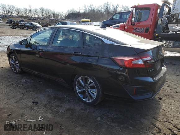 2018 Honda Clarity Plug-In Hybrid with VIN JHMZC5F13JC003825, listed as a Copart auction lot 39572674 with 49,553 mi miles. Bid and sale history available at carsss.com. Image 2.