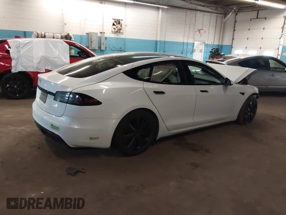 2022 Tesla Model S z VIN 5YJSA1E59NF493914, wystawiony jako IAAI lot #41626020 z przebiegiem Nie podano mil oraz . Historia ofert i sprzedaży dostępna na DreamBid. Obrazek 4.