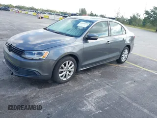 2011 Volkswagen Jetta Sedan SE w/Convenience & Sunroof with VIN 3VWDX7AJ9BM306477, listed as a IAAI auction lot 42144071 with 139,970 mi miles. Bid and sale history available at carsss.com. Image 2.