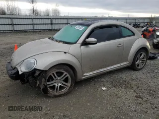2013 Volkswagen Beetle 2.5L w/Sun with VIN 3VWJP7AT2DM673129, listed as a Copart auction lot 43284955 with 145,864 mi miles and Salvage title. Bid and sale history available at DreamBid. Image 1.