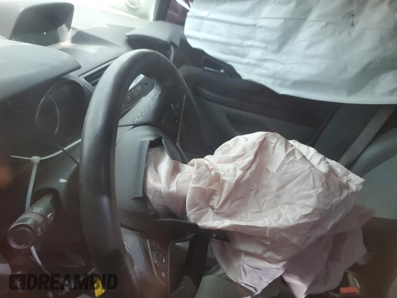 2016 Buick Encore with VIN KL4CJASB0GB697015, listed as a Copart auction lot 52447055 with Not Provided miles and Salvage Title. Bid and sale history available at DreamBid. Image 8.