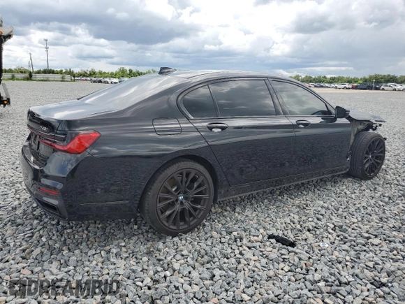 2021 BMW 7 Series 740i with VIN WBA7T2C01MCF78660, listed as a Copart auction lot 59582205 with 51,868 mi miles and Salvage title. Bid and sale history available at DreamBid. Image 3.