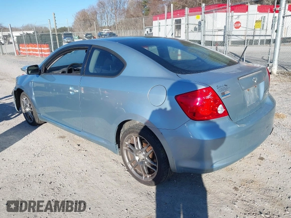 2006 Scion tC with VIN JTKDE177960090990, listed as a IAAI auction lot 41690362 with 197,613 mi miles. Bid and sale history available at carsss.com. Image 3.