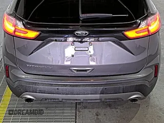2021 Ford Edge Titanium z VIN 2FMPK3K92MBA53689, wystawiony jako IAAI lot #42501151 z przebiegiem 93 941 mil mil oraz . Historia ofert i sprzedaży dostępna na DreamBid. Obrazek 17.