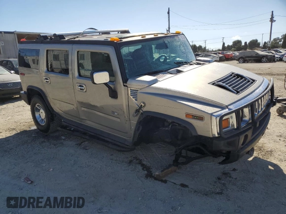 2003 Hummer H2 with VIN 5GRGN23U93H132656, listed as a Copart auction lot 71987404 with 152,287 mi miles and Salvage Title. Bid and sale history available at carsss.com. Image 4.