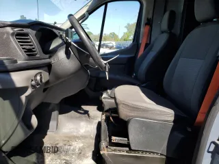 2020 Ford Transit Cargo with VIN 1FTBR3X8XLKA72246, listed as a Copart auction lot 57000035 with 65,458 mi miles and Salvage Title. Bid and sale history available at DreamBid. Image 7.