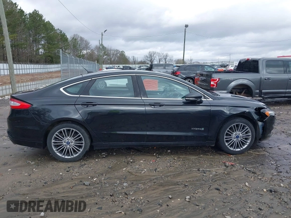 2014 Ford Fusion SE Hybrid with VIN 3FA6P0LU2ER133294, listed as a IAAI auction lot 41696064 with 150,537 mi miles. Bid and sale history available at carsss.com. Image 13.