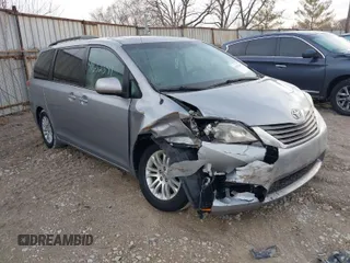 2013 Toyota Sienna XLE AAS with VIN 5TDYK3DC8DS387774, listed as a IAAI auction lot 41632341 with 176,938 mi miles and . Bid and sale history available at carsss.com. Image 1.