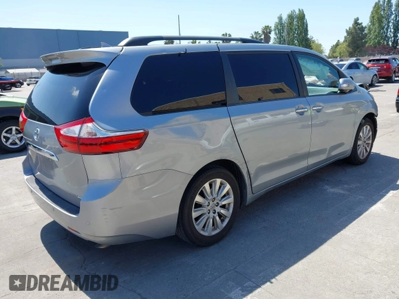 2015 Toyota Sienna XLE with VIN 5TDYK3DC5FS594514, listed as a IAAI auction lot 42183673 with 120,978 mi miles and . Bid and sale history available at DreamBid. Image 4.