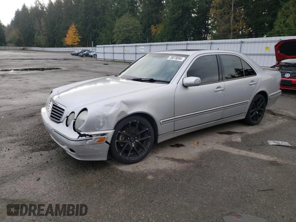 2002 Mercedes-Benz E-Class with VIN WDBJF65J62B473334, listed as a Copart auction lot 78078894 with 136,073 mi miles and Salvage Title. Bid and sale history available at carsss.com. Image 1.
