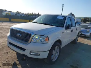 2007 Ford F-150 XLT with VIN 1FTPW12527FB74543, listed as a IAAI auction lot 41723554 with 217,242 mi miles. Bid and sale history available at carsss.com. Image 2.