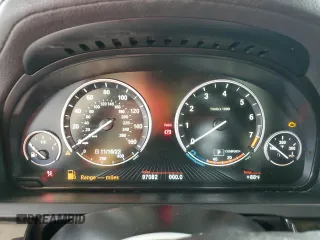 2013 BMW 7 Series 740i with VIN WBAYA6C5XDD143639, listed as a Copart auction lot 62296694 with 97,082 mi miles and Salvage Title. Bid and sale history available at carsss.com. Image 9.