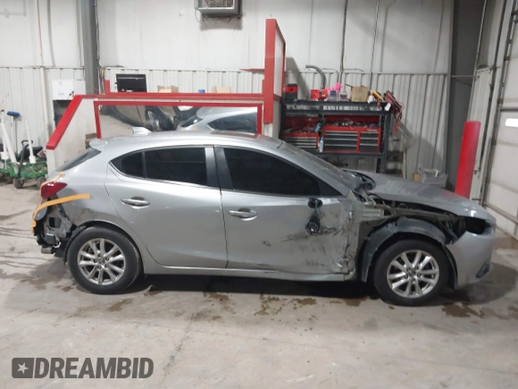 2015 Mazda 3 i Touring with VIN 3MZBM1L73FM214740, listed as a IAAI auction lot 41402534 with 83,436 mi miles and . Bid and sale history available at carsss.com. Image 14.