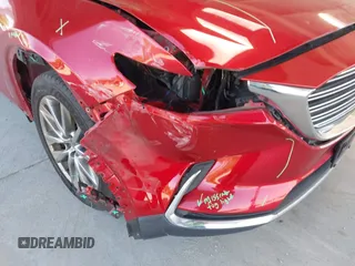 2017 Mazda CX-9 Grand Touring с VIN JM3TCADY6H0133052, выставлен на аукционе IAAI как лот 42269586 с пробегом 100 276 миль миль и . История ставок и продаж доступна на DreamBid. Изображение 6.