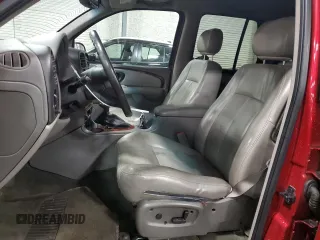 2003 Oldsmobile Bravada z VIN 1GHDT13S132216227, wystawiony jako Copart lot #84266484 z przebiegiem 156 431 mil mil oraz Szkody całkowita. Historia ofert i sprzedaży dostępna na DreamBid. Obrazek 7.