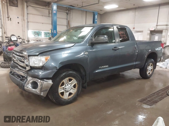 2010 Toyota Tundra 4WD Truck with VIN 5TFUM5F16AX006879, listed as a IAAI auction lot 40447273 with 219,498 mi miles. Bid and sale history available at carsss.com. Image 2.