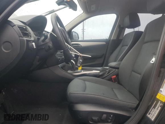2015 BMW X1 sDrive28i with VIN WBAVM1C55FVW56937, listed as a Copart auction lot 45050785 with 77,736 mi miles and Salvage Title. Bid and sale history available at carsss.com. Image 7.