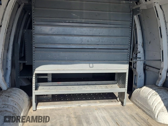 2013 Chevrolet Express Cargo with VIN 1GCWGFCA6D1142155, listed as a IAAI auction lot 42670323 with 213,723 mi miles and . Bid and sale history available at DreamBid. Image 41.
