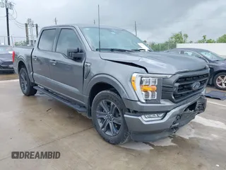 2023 Ford F-150 XL with VIN 1FTEW1C53PKD58824, listed as a IAAI auction lot 40265055 with 25,958 mi miles. Bid and sale history available at carsss.com. Image 1.
