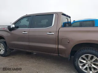 2019 Chevrolet Silverado 1500 LTZ with VIN 3GCUYGEL9KG228891, listed as a IAAI auction lot 41053828 with 61,684 mi miles. Bid and sale history available at carsss.com. Image 14.