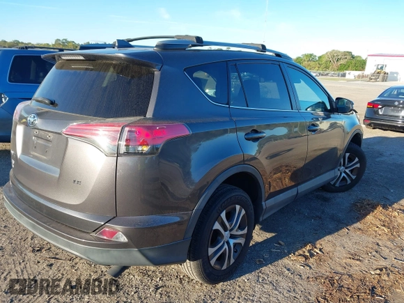 2017 Toyota RAV4 LE with VIN 2T3ZFREV0HW354624, listed as a IAAI auction lot 41851021 with 66,174 mi miles and . Bid and sale history available at carsss.com. Image 4.