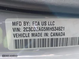 2021 Dodge Challenger SXT with VIN 2C3CDZAG5MH534621, listed as a IAAI auction lot 41667234 with 78,947 mi miles. Bid and sale history available at carsss.com. Image 9.