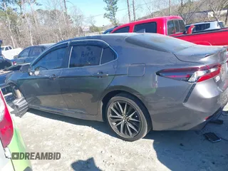 2023 Toyota Camry SE with VIN 4T1G11AK5PU116584, listed as a IAAI auction lot 41298269 with 28,994 mi miles. Bid and sale history available at carsss.com. Image 14.