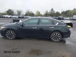 2018 Nissan Altima SR with VIN 1N4AL3AP9JC139011, listed as a IAAI auction lot 42018392 with 163,674 mi miles and . Bid and sale history available at carsss.com. Image 15.