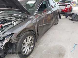 2023 Toyota Camry LE z VIN 4T1C11AK3PU719452, wystawiony jako IAAI lot #38236100 z przebiegiem 34 140 mil mil oraz . Historia ofert i sprzedaży dostępna na DreamBid. Obrazek 12.