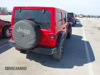 2020 Jeep Wrangler Unlimited Rubicon with VIN 1C4HJXFG3LW186387, listed as a IAAI auction lot 41821939 with 45,691 mi miles and . Bid and sale history available at DreamBid. Image 4.