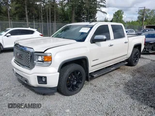 2014 GMC Sierra 1500 Denali z VIN 3GTU2WEJXEG527496, wystawiony jako IAAI lot #42211521 z przebiegiem 151 974 mil mil oraz . Historia ofert i sprzedaży dostępna na DreamBid. Obrazek 2.