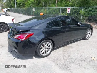 2013 Hyundai Genesis Coupe Grand Touring with VIN KMHHU6KJ4DU084544, listed as a IAAI auction lot 42392452 with 58,916 mi miles and . Bid and sale history available at DreamBid. Image 4.