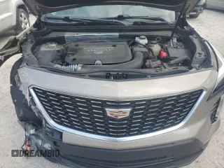 2022 Cadillac XT4 FWD Luxury with VIN 1GYAZAR4XNF121008, listed as a Copart auction lot 77599974 with 29,141 mi miles and Salvage title. Bid and sale history available at DreamBid. Image 12.
