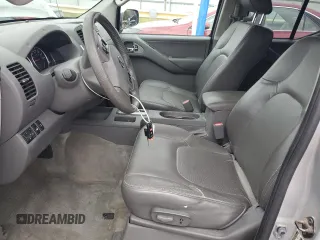 2014 Nissan Frontier SL z VIN 1N6AD0FV2EN720242, wystawiony jako Copart lot #86976214 z przebiegiem 118 581 mil mil oraz Szkoda całkowita • Salvage title. Historia ofert i sprzedaży dostępna na DreamBid. Obrazek 7.