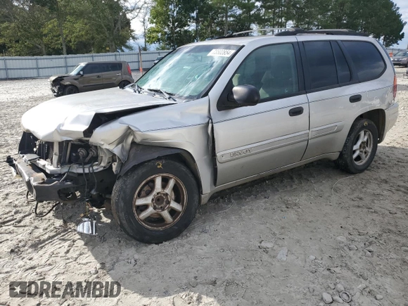 2004 GMC Envoy SLE with VIN 1GKDS13S142309781, listed as a Copart auction lot 73502854 with 349,449 mi miles and Salvage Title. Bid and sale history available at carsss.com. Image 1.