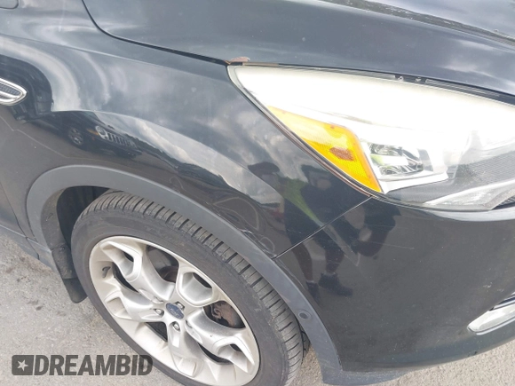 2015 Ford Escape Titanium with VIN 1FMCU9J92FUA96987, listed as a IAAI auction lot 42678423 with 188,956 mi miles and . Bid and sale history available at DreamBid. Image 6.