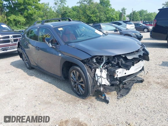 2021 Lexus UX 250h F Sport z VIN JTHE9JBHXM2045377, wystawiony jako IAAI lot #42580566 z przebiegiem 52 838 mil mil oraz . Historia ofert i sprzedaży dostępna na DreamBid. Obrazek 1.
